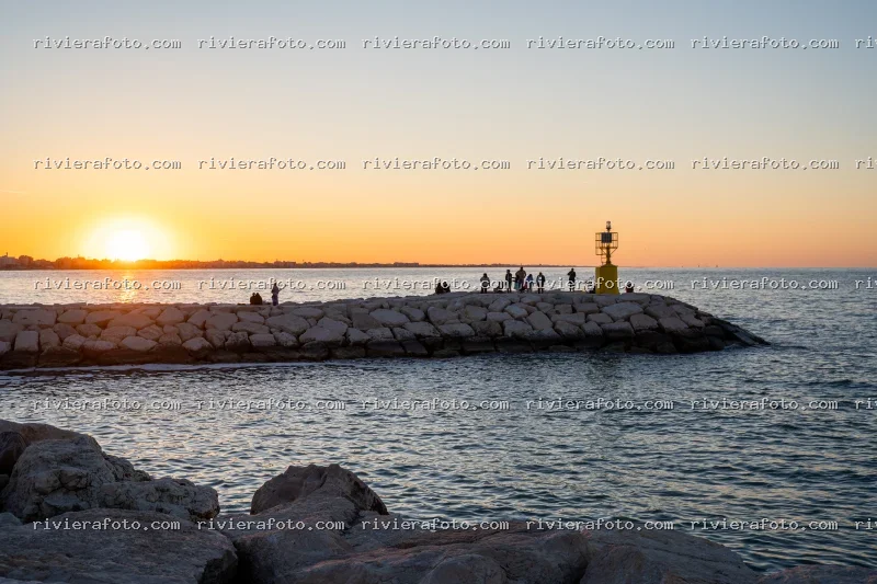 Tramonto sul molo in Riviera Romagnola