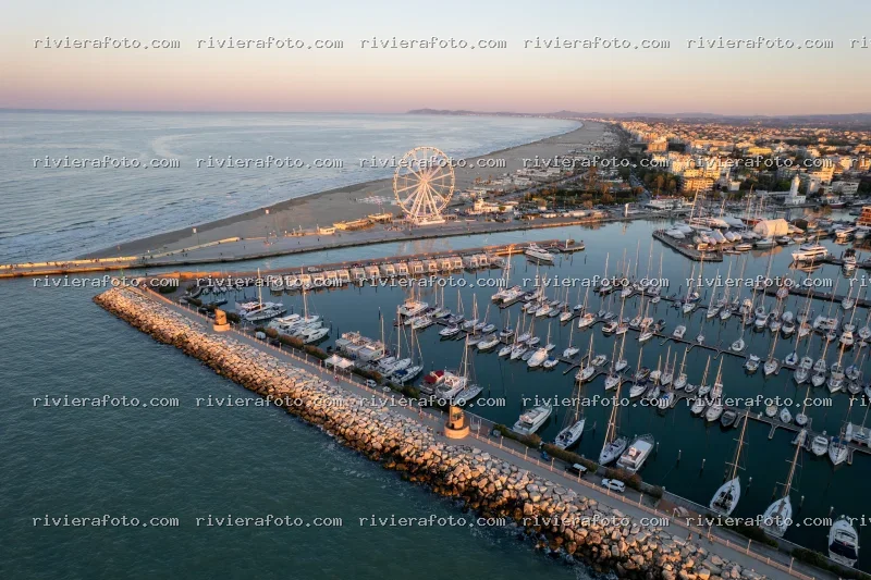 Panorama aereo della Darsena di Rimini e della Ruota Panoramica al tramonto