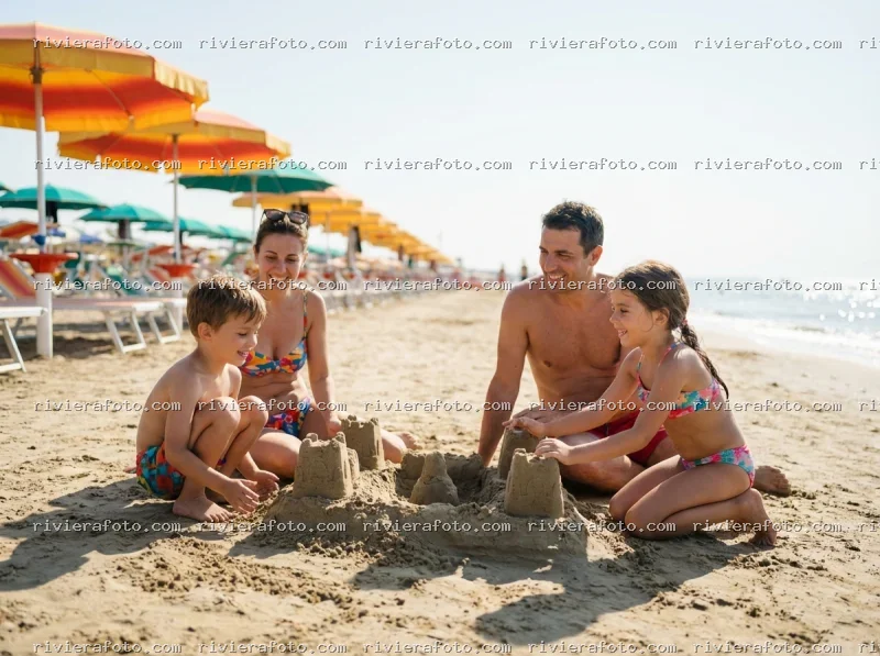 Famiglia in vacanza sulla spiaggia di Rimini, sulla Riviera Romagnola