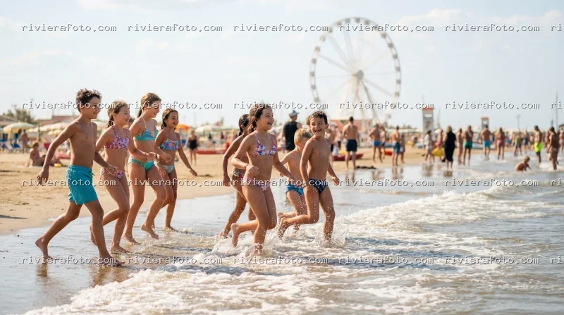 Bambini in festa sulla spiaggia di Rimini con la Ruota Panoramica
